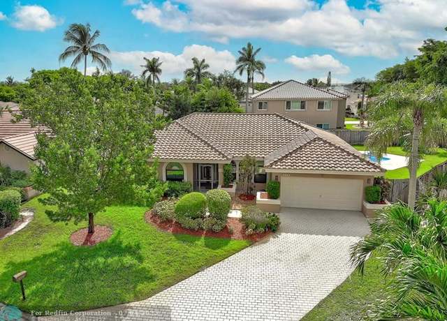 Property at 4661 NW 58th Te, Coral Springs, FL 33067, 4 beds, 2 baths