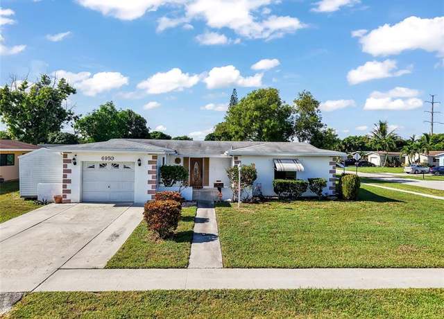 Property at 6950 SW 9th Pl, North Lauderdale, FL 33068, 4 beds, 2 baths