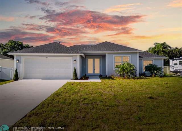 Property at 1014 SW Fisherman Ave, Port St. Lucie, FL 34953, 4 beds, 2 baths