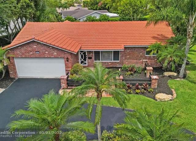Property at 10350 NW 42nd Dr, Coral Springs, FL 33065, 4 beds, 2 baths
