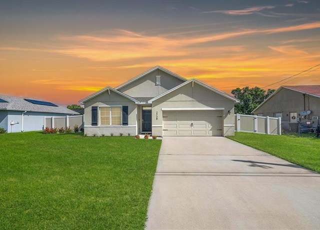 Property at 2725 SE Garfield Ave, Port St. Lucie, FL 34952, 4 beds, 2 baths