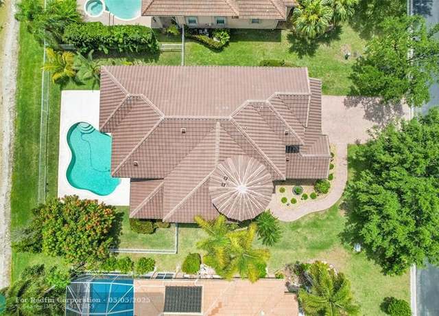 Property at 4835 NW 124th Way, Coral Springs, FL 33076, 5 beds, 4 baths