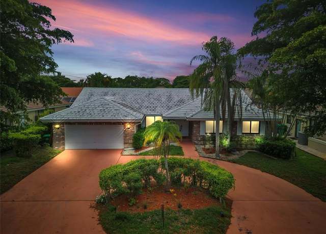 Property at 4664 NW 58th Ter, Coral Springs, FL 33067, 4 beds, 2.5 baths