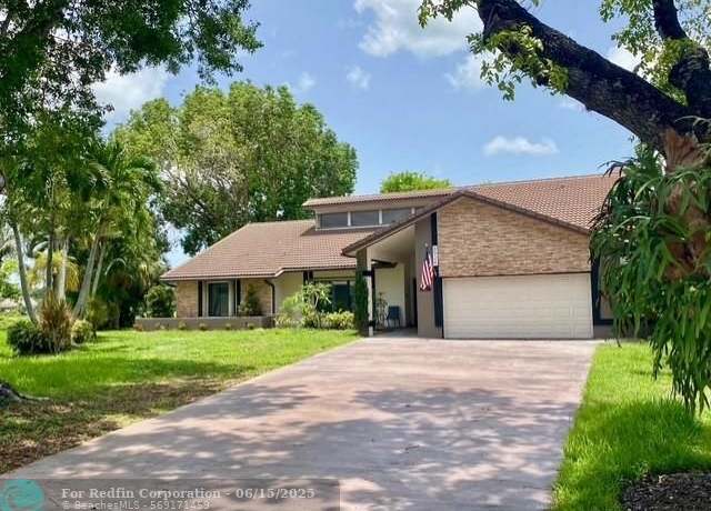 Property at 8924 NW 47th Ct, Coral Springs, FL 33067, 4 beds, 2.5 baths