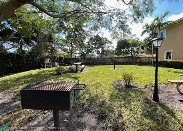 Property at 6028 Woodlands Blvd, Tamarac, FL 33319, 2 beds, 2.5 baths