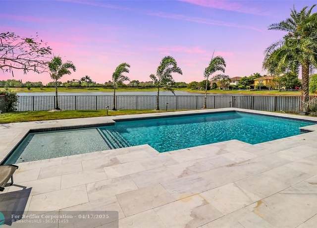 Property at 9726 Blue Isle Bay, Parkland, FL 33076, 5 beds, 4 baths