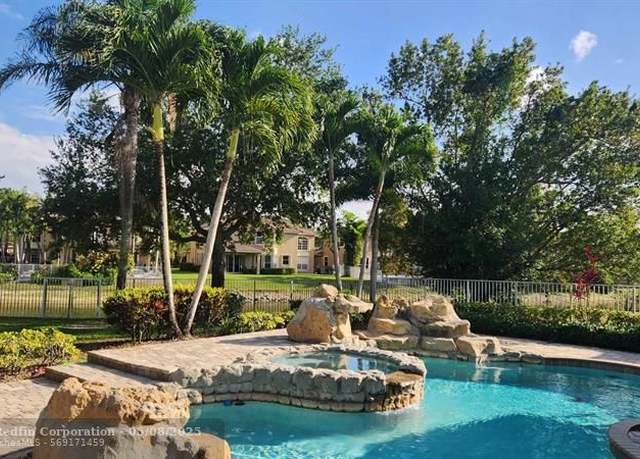 Property at 5896 NW 56th Dr, Coral Springs, FL 33067, 4 beds, 3 baths