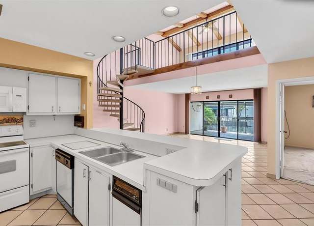 Property at 7026 N Loch Isle Dr, Miami Lakes, FL 33014, 3 beds, 2 baths