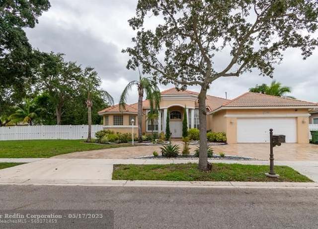 Property at 13702 NW 16th St, Pembroke Pines, FL 33028, 5 beds, 3 baths