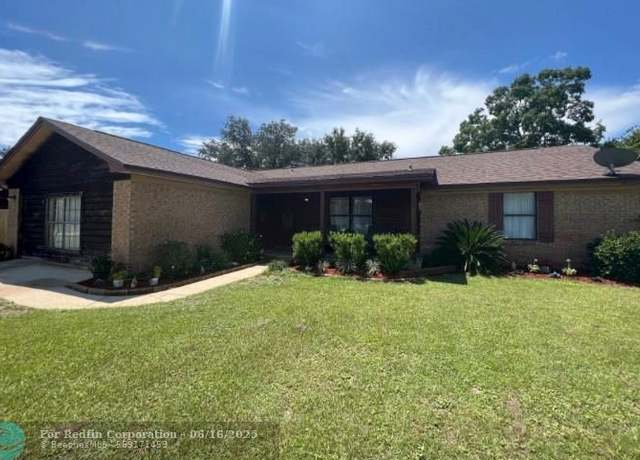 Property at 7489 Sandstone St, FL 32566, 4 beds, 2 baths