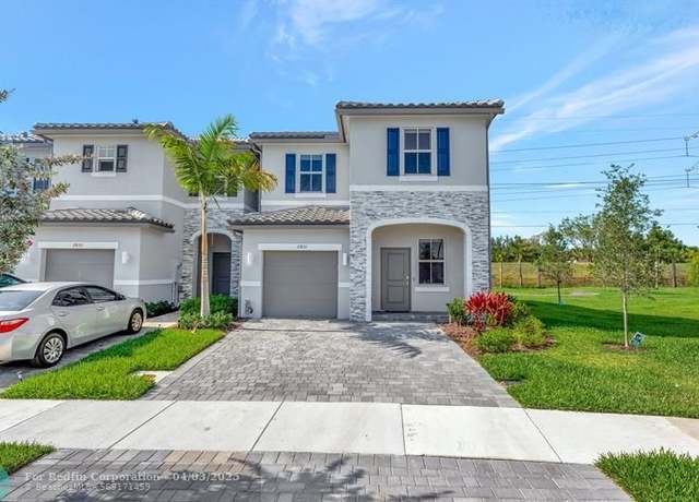 Property at 11831 NW 47th Mnr, Coral Springs, FL 33076, 4 beds, 3 baths