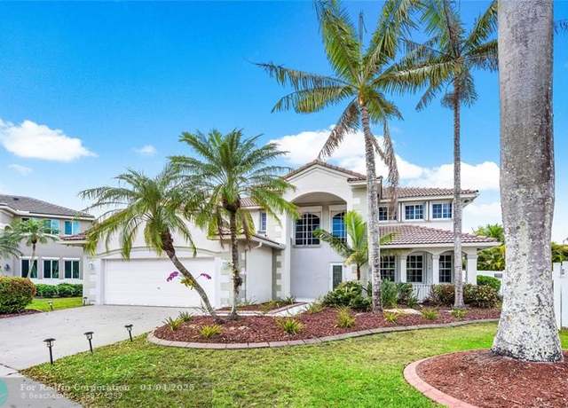 Property at 936 Greenwood Rd, Weston, FL 33327, 5 beds, 3 baths