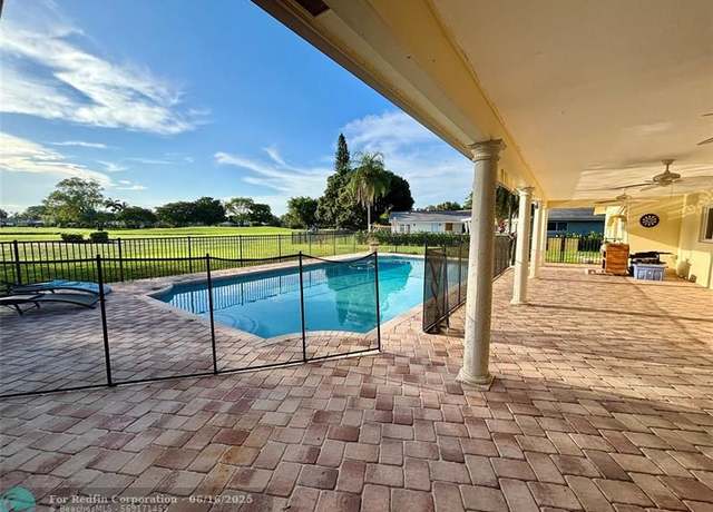 Property at 11140 NW 26th Dr, Coral Springs, FL 33065, 4 beds, 4 baths
