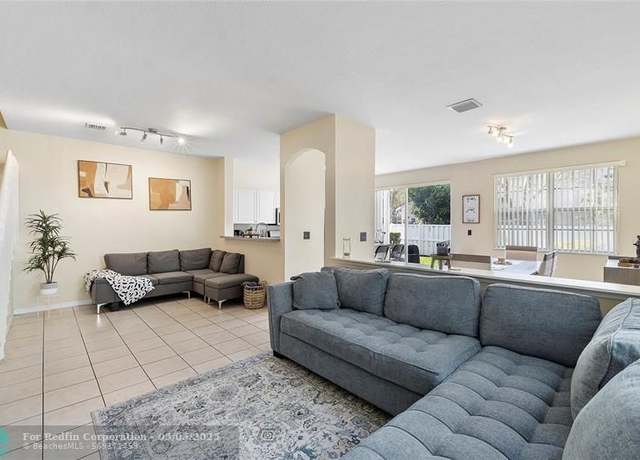 Property at 9090 NW 40th Pl, Sunrise, FL 33351, 4 beds, 2.5 baths