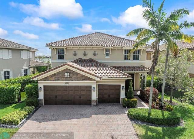 Property at 10021 S Miralago Way, Parkland, FL 33076, 4 beds, 4 baths