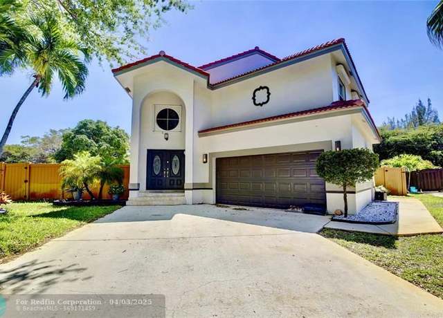 Property at 5900 NW 58th Ter, Parkland, FL 33067, 3 beds, 2.5 baths