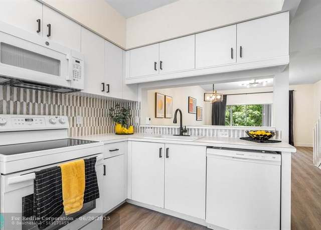 Property at 49 Whitehead Cir, Weston, FL 33326, 2 beds, 2.5 baths
