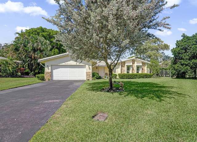 Property at 8845 NW 29th Pl, Coral Springs, FL 33065, 4 beds, 2 baths