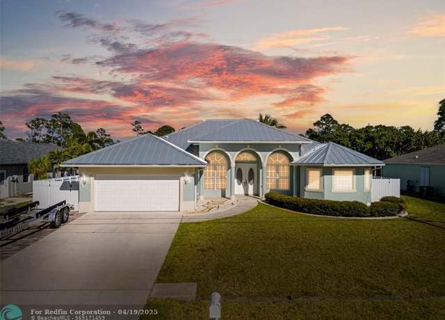 Property at 3073 SW Ann Arbor Rd, Port St. Lucie, FL 34953, 4 beds, 3 baths