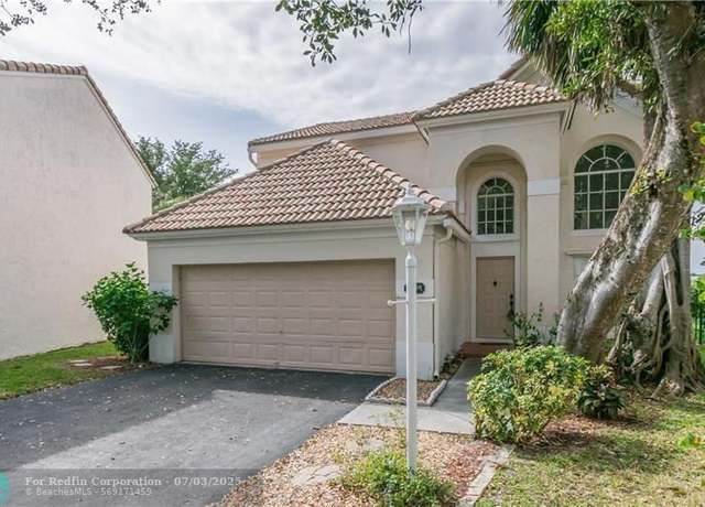 Property at 7722 Hibiscus Ln, Coral Springs, FL 33065, 3 beds, 2.5 baths