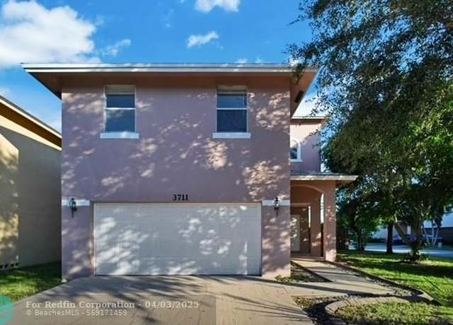 Property at 3711 NW 23rd Pl, Coconut Creek, FL 33066, 4 beds, 2.5 baths