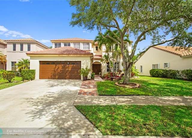 Property at 372 Carrington Dr, Weston, FL 33326, 5 beds, 3 baths