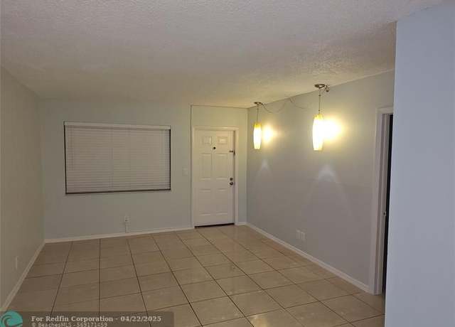 Property at 3777 NW 78th Ave Unit 1B, Hollywood, FL 33024, 2 beds, 1.5 baths