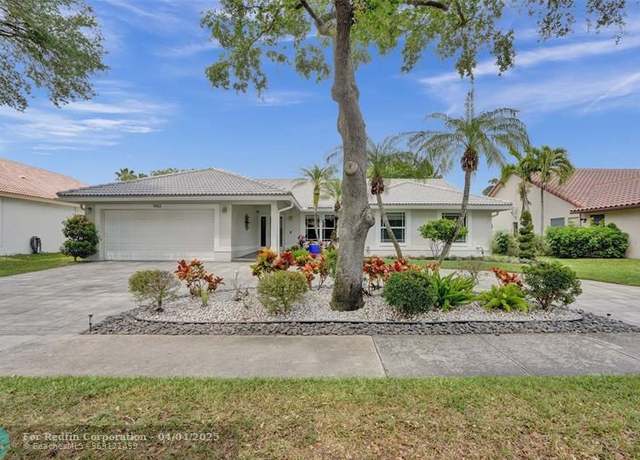 Property at 9965 NW 48th Dr, Coral Springs, FL 33076, 4 beds, 2 baths