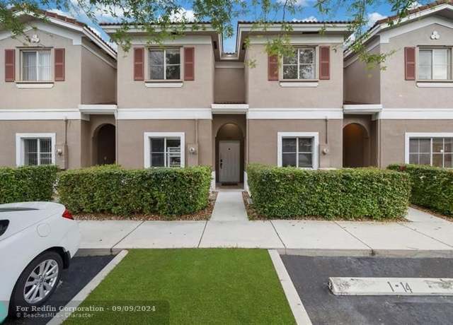 Property at 4412 Woodland Cir, Tamarac, FL 33319, 3 beds, 3 baths