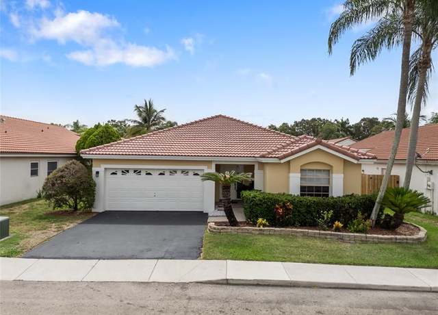 Property at 1022 NW 125th Ave, Sunrise, FL 33323, 3 beds, 2 baths