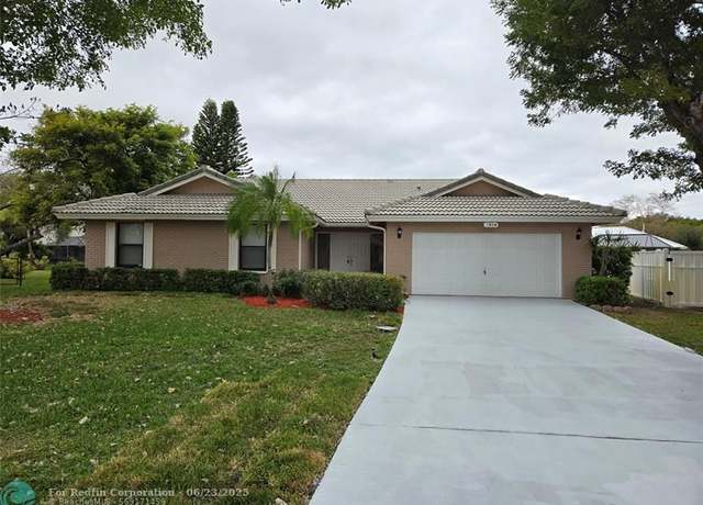 Property at 7219 NW 43rd St, Coral Springs, FL 33065, 4 beds, 2.5 baths