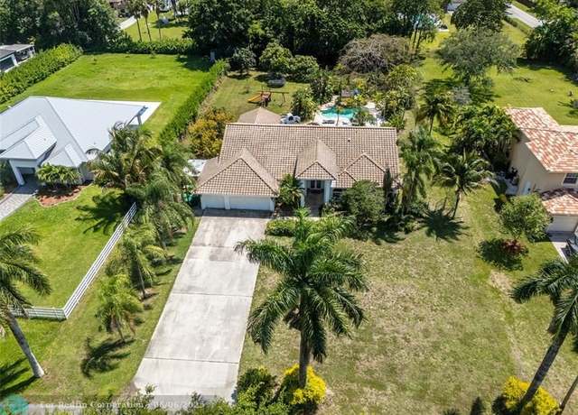Property at 14463 SW 16th Ct, Davie, FL 33325, 5 beds, 3 baths