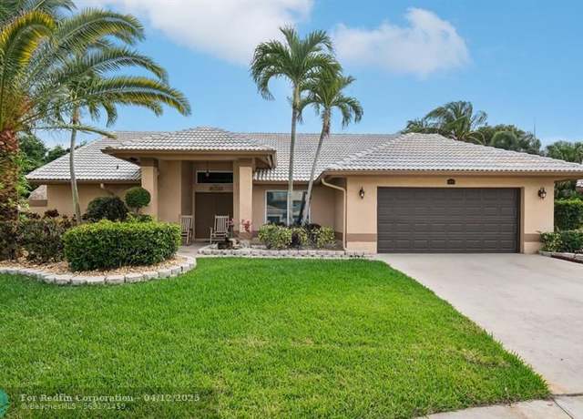 Property at 6491 Wetland Dr, FL 33467, 4 beds, 2 baths