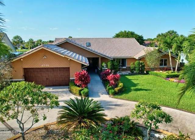 Property at 8701 Banyan Ct, Tamarac, FL 33321, 4 beds, 3.5 baths