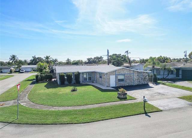 Property at 9680 NW 25th St, Sunrise, FL 33322, 4 beds, 3 baths