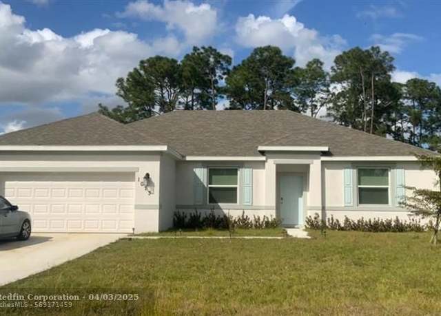 Property at 1073 SW Mantila Ave, Port St. Lucie, FL 34953, 4 beds, 2 baths
