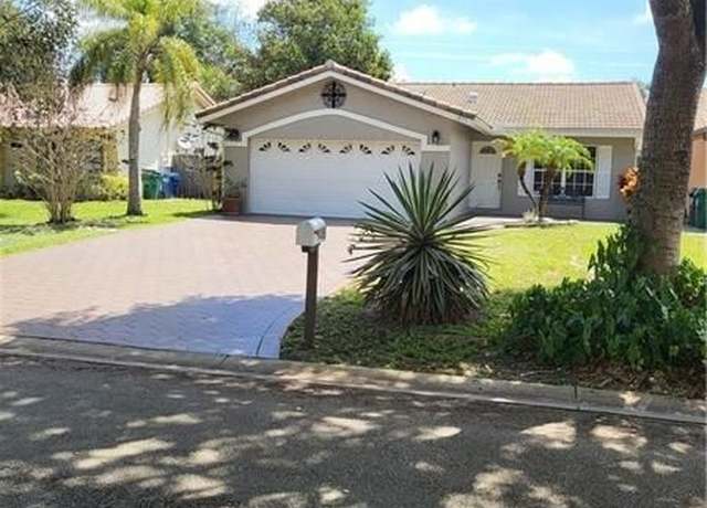 Property at 1499 NW 97th Ter, Coral Springs, FL 33071, 4 beds, 2.5 baths
