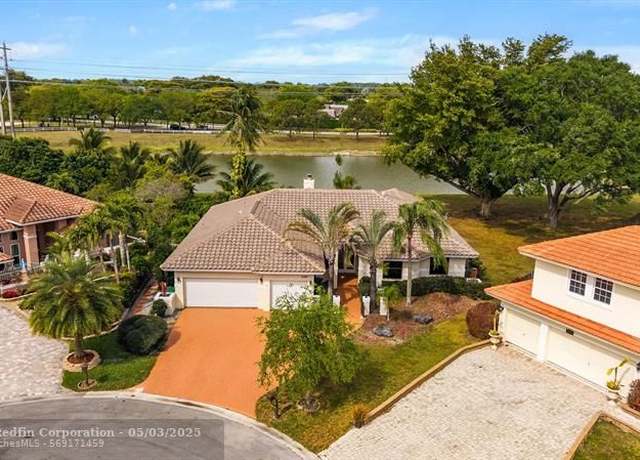 Property at 6797 NW 44th Ct, Coral Springs, FL 33067, 4 beds, 2.5 baths