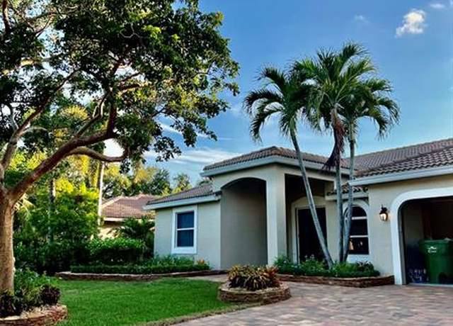 Property at 4910 NW 104th Ave, Coral Springs, FL 33076, 5 beds, 2.5 baths