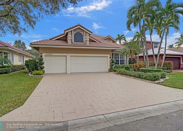 Property at 11834 Highland Pl, Coral Springs, FL 33071, 4 beds, 3 baths