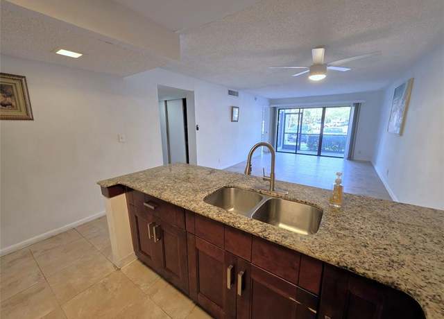 Property at 2320 S Cypress Bend Dr #106, Pompano Beach, FL 33069, 2 beds, 2 baths