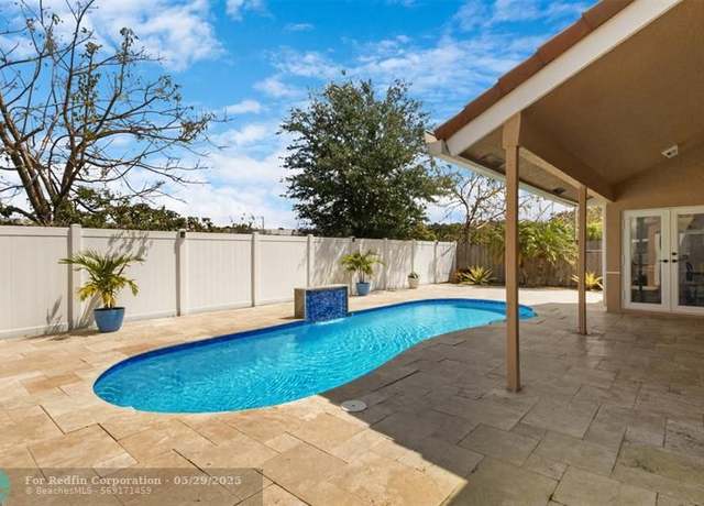Property at 9681 NW 39th Ct, Cooper City, FL 33024, 3 beds, 2.5 baths