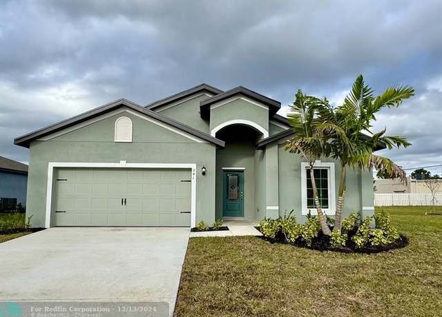 Property at 941 SW Castaneda Ln, Port St. Lucie, FL 34953, 4 beds, 2 baths