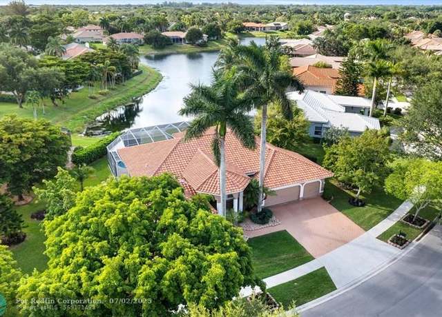 Property at 6689 NW 70th Pl, Parkland, FL 33067, 4 beds, 3 baths