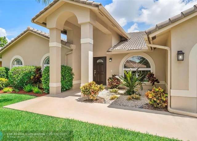 Property at 9751 NW 51st St, Coral Springs, FL 33076, 4 beds, 2 baths
