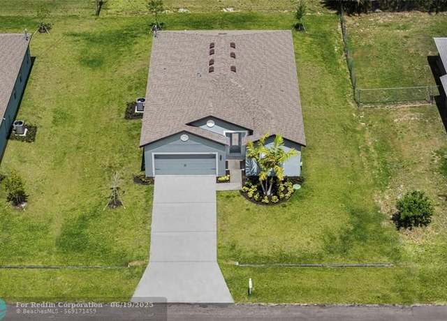 Property at 567 SW Dailey Ave, Port St. Lucie, FL 34953, 5 beds, 3 baths
