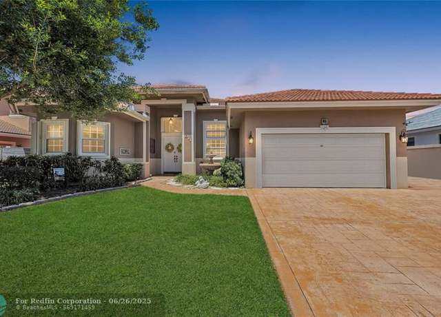 Property at 611 NW 42nd Ave, Coconut Creek, FL 33066, 4 beds, 3 baths