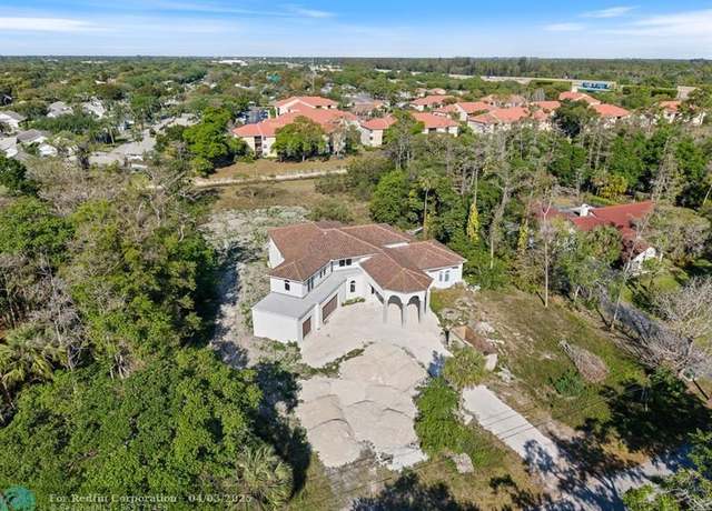 Property at 5433 NW 80th Ter, Parkland, FL 33067, 6 beds, 7.5 baths