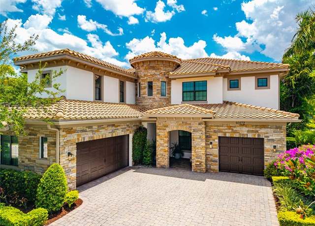 Property at 10172 Emerson St, Parkland, FL 33076, 5 beds, 5.5 baths