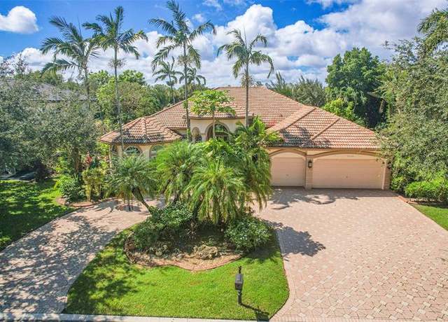 Property at 9350 NW 62nd Ct, Parkland, FL 33067, 5 beds, 3 baths